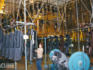 PAC-LINE™ overhead conveyor for assembly of plastic instrument panels.