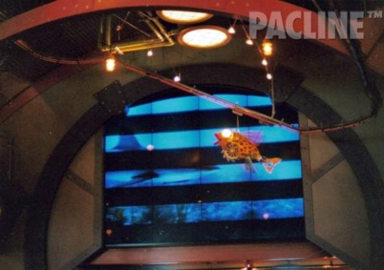 A closer look at the PAC-LINE creative display conveyor system installed in Steven Spielberg&#039;s restaurant to carry miniature ships.