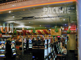 PAC-LINE conveyor in casino used to display and circulate plastic money bags overhead casino goes.