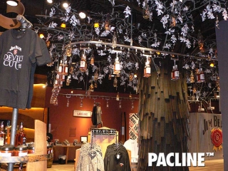 Jim Beam uses a creative retail conveyor to produce a unique bottling display.