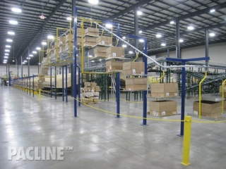 Carton overhead conveyor for distribution center.