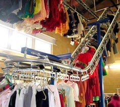 clothing conveyor that runs from the floor to the ceiling.