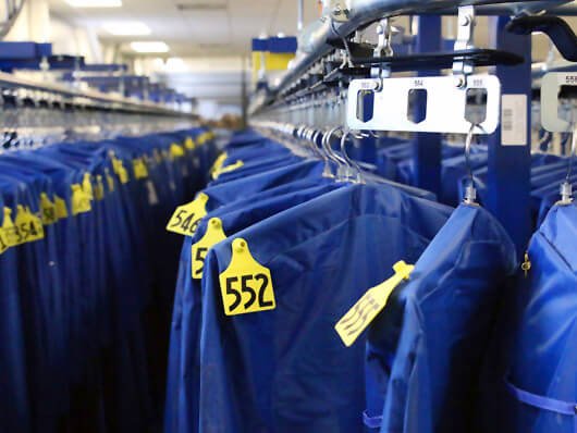 Overhead conveyors for garment automated storage and retrieval