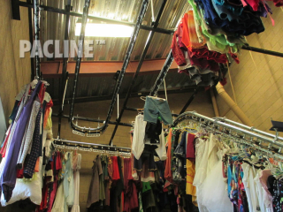 PACLINE&#039;s garment conveyor is used for quick, easy storage and retrieval of hanging items such as coats in restaurants, casinos and hotels.