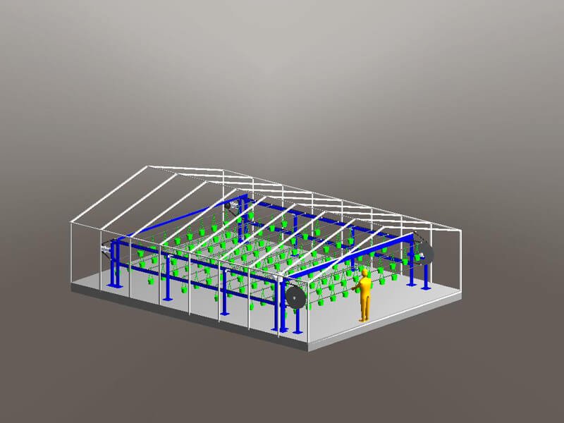 Overhead conveyor automates the movement of plants from the load area in a greenhouse.