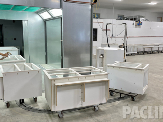 In-floor towline conveyor for custom wood finishing