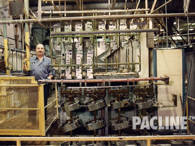 Overhead conveyor for metal finishing process