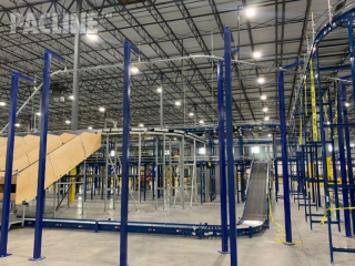 Empty box line in distribution center for performance footwear and clothing brand retailer