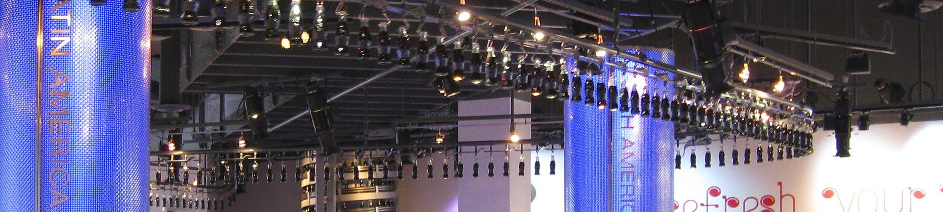 Overhead conveyor for retail store display Overhead conveyor for retail store and restaurant displays.