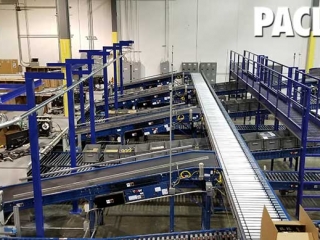 Overhead conveyor carrying empty boxes for an empty distribution warehouse.