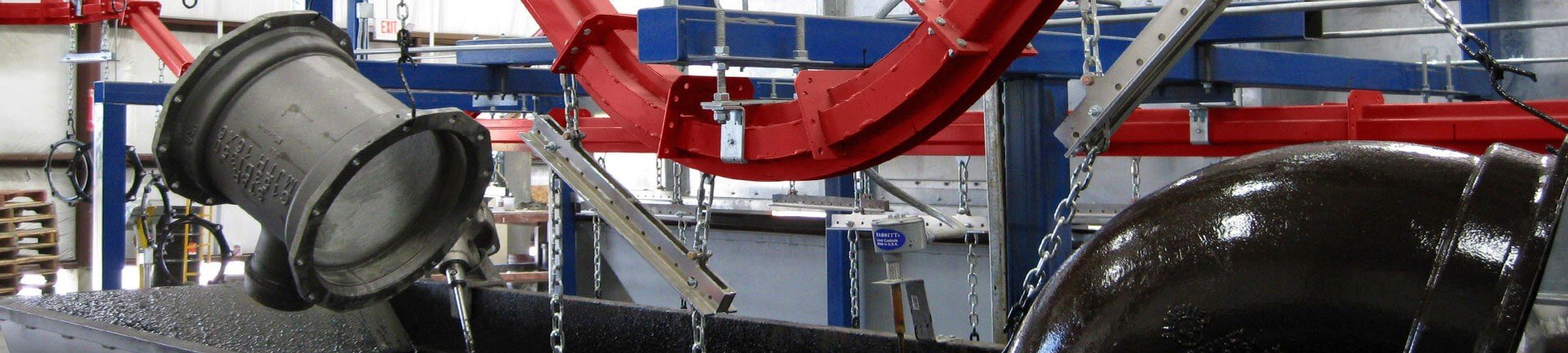 Overhead conveyors are a great option for handling products through an automated finishing system involving dip tanks.