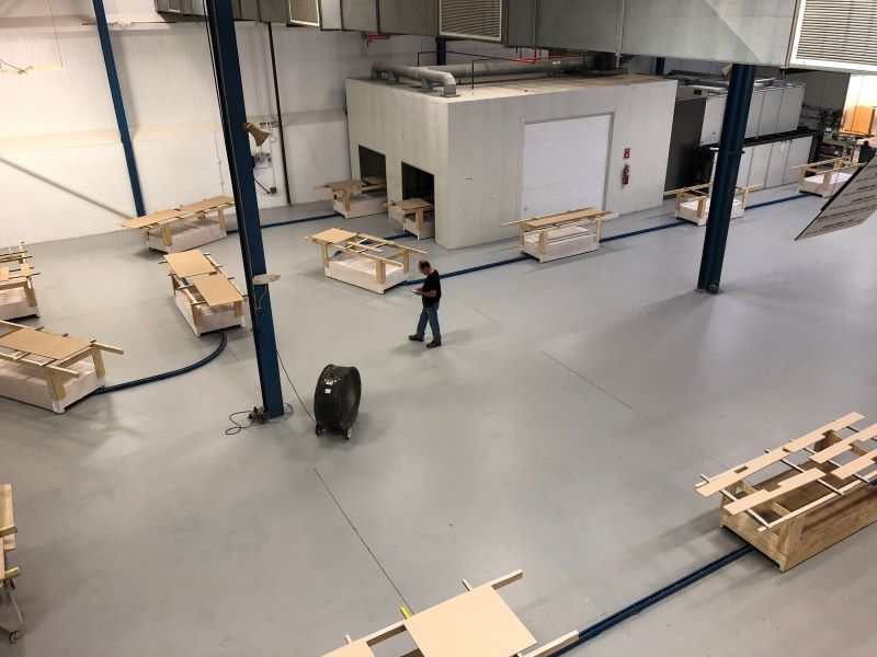 in-floor towline conveyor for wood finishing