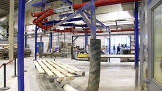 Conveyor Handles Long Parts Through Specialized Paint Process