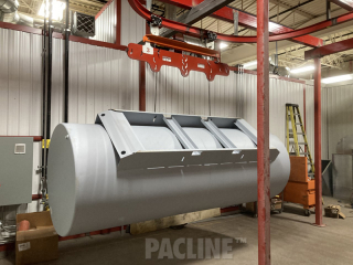 Overhead conveyor system for handling heavy tanks