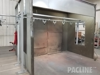 Overhead paint conveyor for a powder coating line.