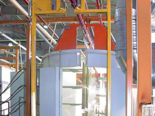 Powder coating of steel safe components using long load bars and bias banking for storage.
