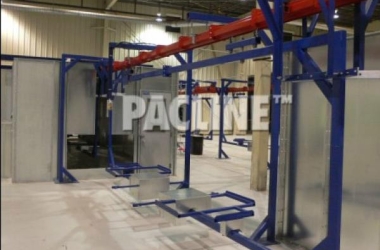 This PAC-MAX overhead monorail conveyor is set up to move carriers for large parts through a wet painting process.