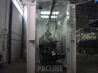 I-beam conveyor with indexing hooks used in the paint finishing of heavy truck suspension components.