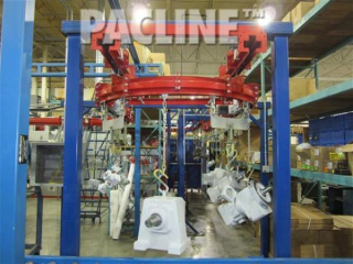 This heavy duty overhead conveyor moves products with various sizes and weight through painting and curing stages.