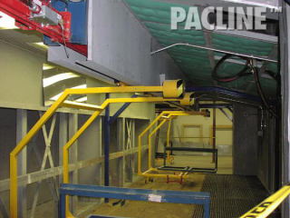 Large bathtubs finishing system using S-310 Power and Free enclosed track conveyor.