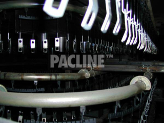 Pre-heating of seat belt components prior to liquidized bed coating, using the PAC-LINE™ overhead conveyor.