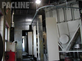 Powder coating of storage locker components on rotating carriers, the PAC-LINE™ enclosed track overhead conveyor.