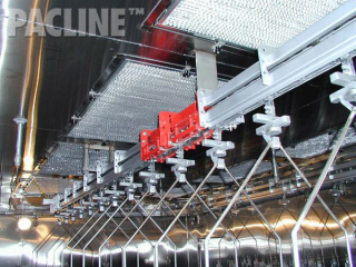 Plastics finishing for automotive parts with robotic load and unload, S-310 power and free overhead conveyor.