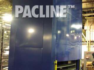 Pacline vertical carousel is used to accumulate and hold hot cast aluminum parts while cooling.