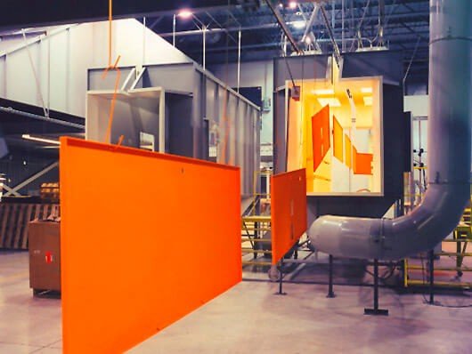 Power and free conveyors and overhead conveyors suitable for handling products through a powder coating line