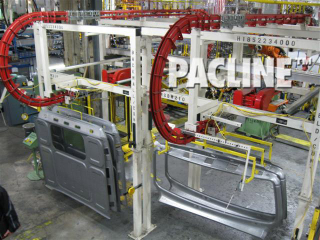 Power and free overhead conveyor system used to accumulate auto body panels in assembly operation.