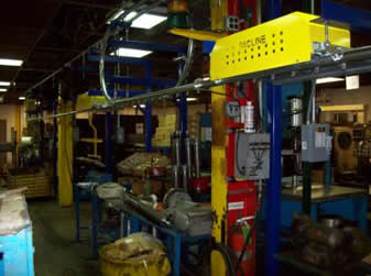 Powered over/under conveyor