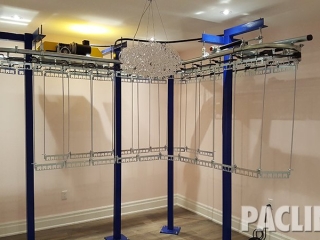 Residential garment conveyor for clothing storage.