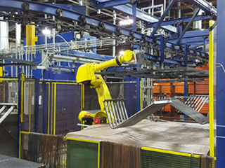 Robotics integration solutions with overhead conveyor systems