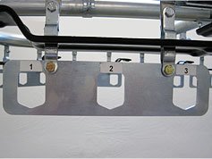 Storage racks for garment conveyor systems.