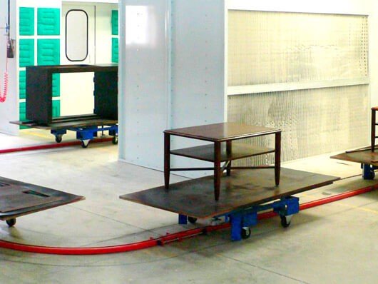 Photos of recently installed floor mounted towline conveyors.