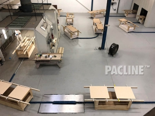 In-floor conveyor system for wood furniture finishing system.