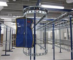 Two tier conveyor system for inmate property storage allows double the capacity in the same space.