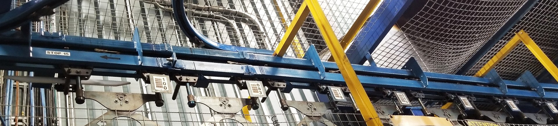 Pacline carries Unibilt power and free conveyors Pacline carries Unibilt power and free conveyors