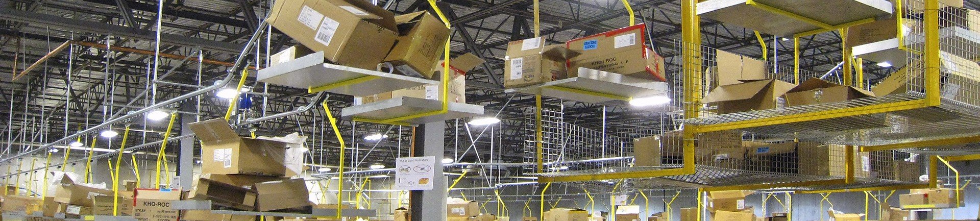 Conveyor removes corrugated carton trash in warehouses and distribution centers.