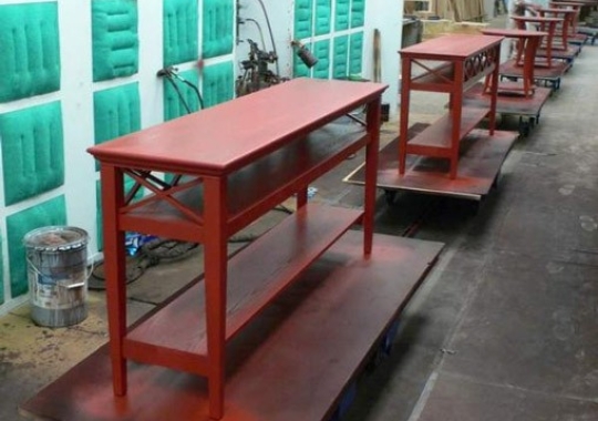 Furniture that is difficult to convey on an overhead conveyor is ideally handled by the PAC-TRAK towline system.
